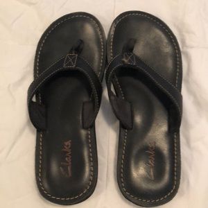 Black leather flip flops